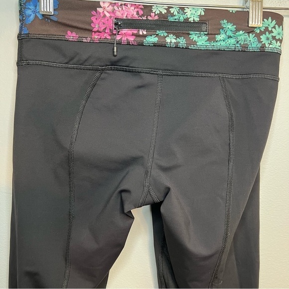 Lululemon Pants Black Cropped Leggings Floral Waist Band Yoga Running Logo Sz 4 - Picture 4 of 10